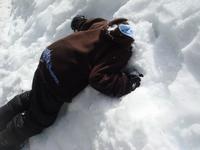 Deion being baptized in the snow